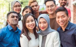 Group of diverse younger adults smiling together