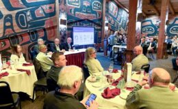 Photo of people seated as three Harborview Bond team members present to people attending the Construction Management Association of America Pacific Northwest Chapter meeting.