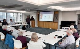 Photo of two Harborview Bond Program team members (Ted and Melvin) presenting at a First Hill neighborhood meeting