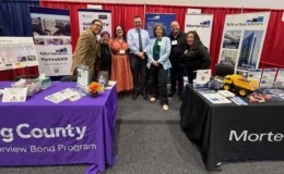 Photo of the King County Harborview construction division team members and members of construction company Mortenson